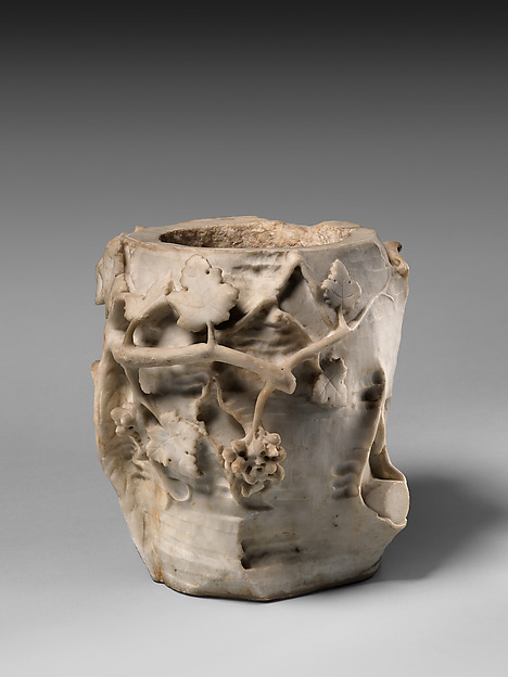 Marble cinerary urn in the form of a tree stump with leaves and grapes by an unrecorded maker, The Metropolitan Museum of Art