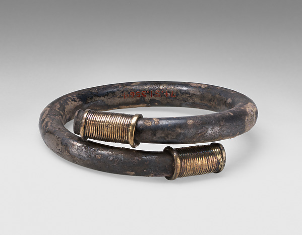 Silver bracelet with gold terminals