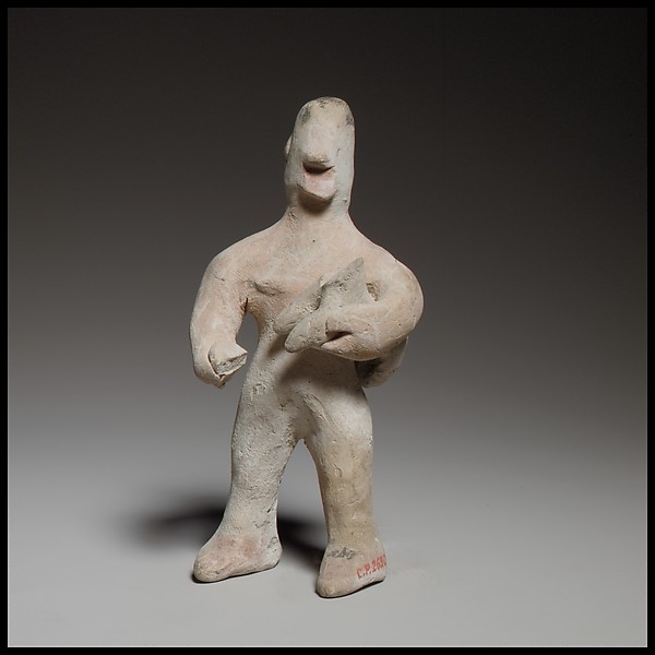 Standing male figurine holding a quadruped by an unrecorded maker, The Metropolitan Museum of Art