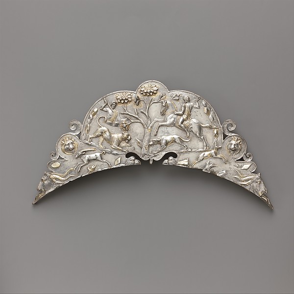 Silver handle of a large dish