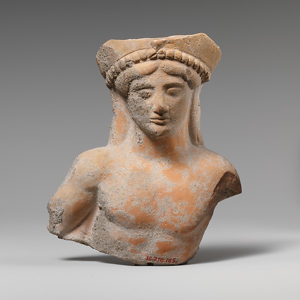 Terracotta relief of a reclining youth