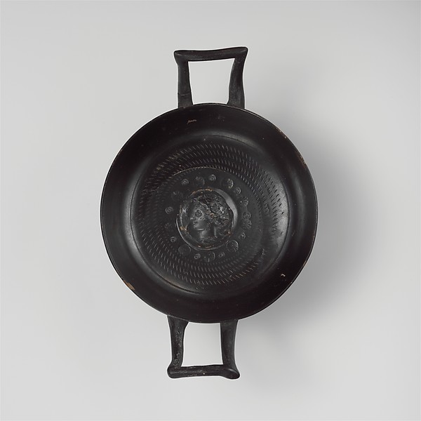 Terracotta stemless kylix (drinking cup)