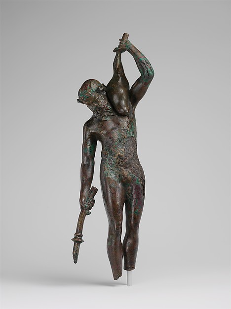 Bronze statuette of a satyr with a torch and wineskin by an unrecorded maker, The Metropolitan Museum of Art