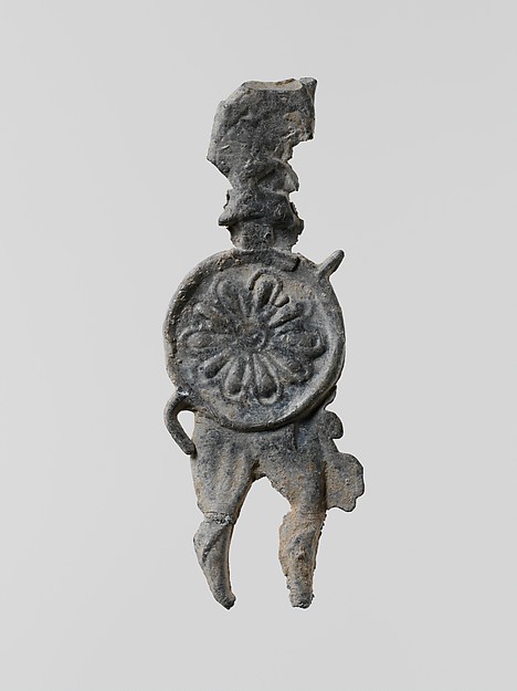 Lead figure of a warrior with a helmet, shield, and spear by an unrecorded maker, The Metropolitan Museum of Art