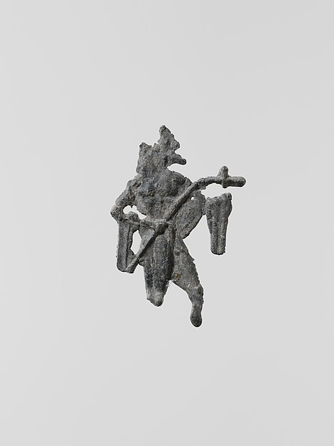 Lead figure of a man with a spear or scepter