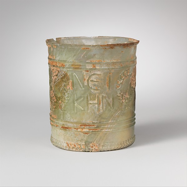 Glass beaker with inscription