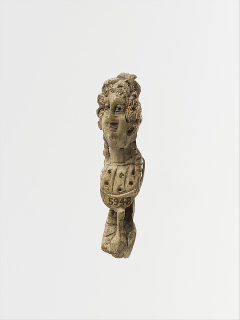 Bone pin head with female bust