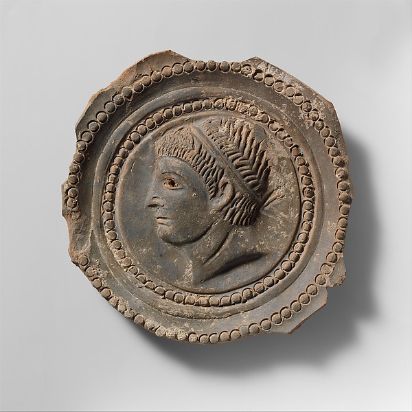 Fragmentary terracotta bowl with tondo