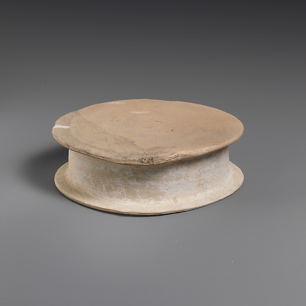 Terracotta statuette base, 3rd century BCE