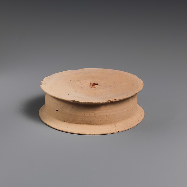 Terracotta statuette base, 3rd century BCE