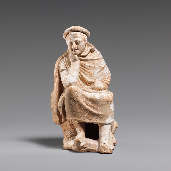 Terracotta statuette of a youth seated on a rock by an unrecorded maker, The Metropolitan Museum of Art