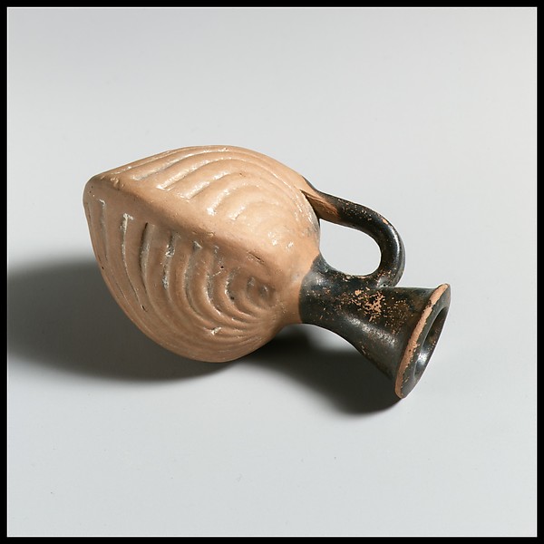 Terracotta vase in the form of two cockle shells