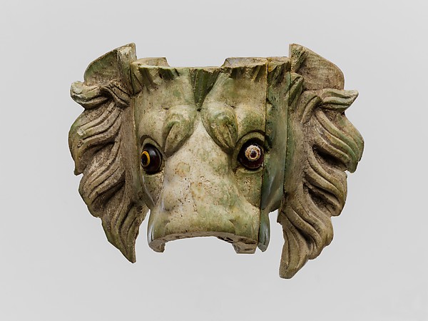 Bone lion's head protome with glass eyes by an unrecorded maker, The Metropolitan Museum of Art