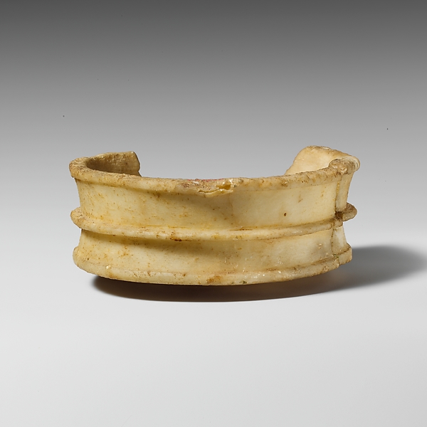 Fragmentary alabaster stemmed bowl