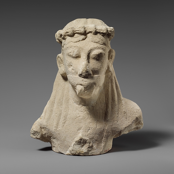 Upper part of a limestone statuette of a male aulos player by an unrecorded maker, The Metropolitan Museum of Art