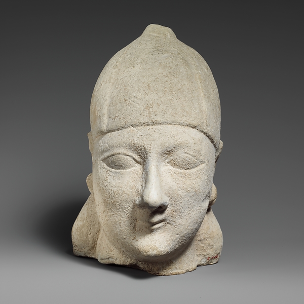 Limestone head of a beardless male wearing a conical helmet by an unrecorded maker, The Metropolitan Museum of Art