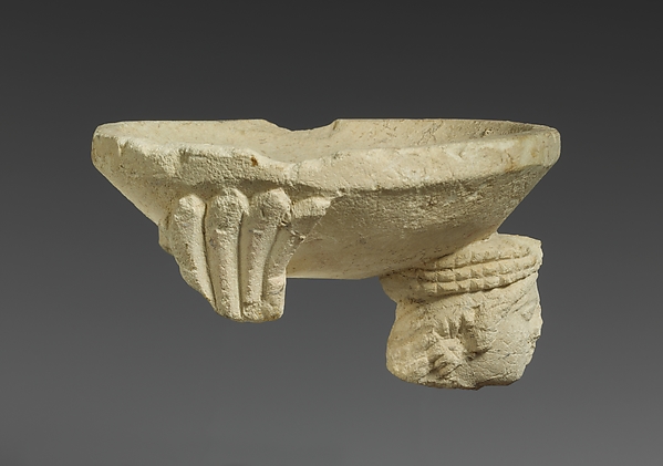 Limestone fragment of a sphinx supporting an incense burner by an unrecorded maker, The Metropolitan Museum of Art