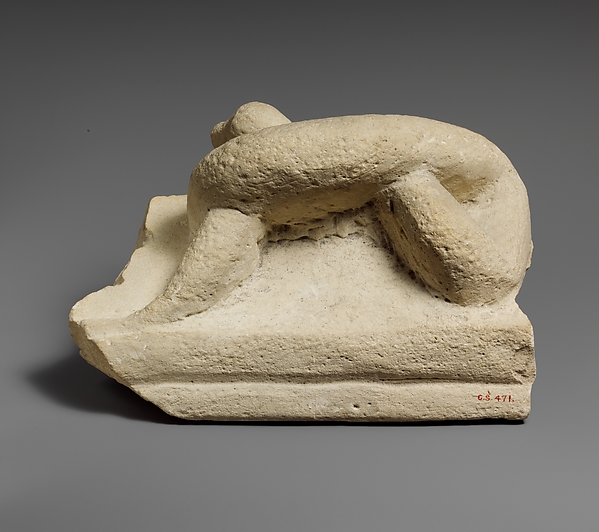 Two fragments of a limestone sarcophagus lid with snakes by an unrecorded maker, The Metropolitan Museum of Art