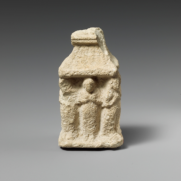 Limestone naiskos with female figures holding their breasts