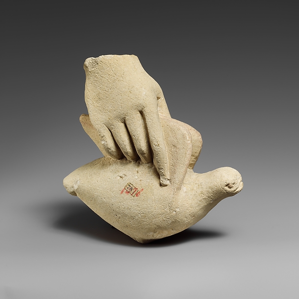 Limestone hand holding a dove by an unrecorded maker, The Metropolitan Museum of Art