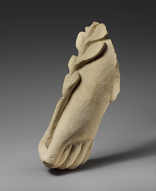 Limestone hand holding a branch of leaves by an unrecorded maker, The Metropolitan Museum of Art