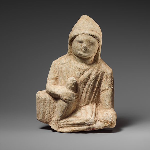 Limestone statuette of a temple boy