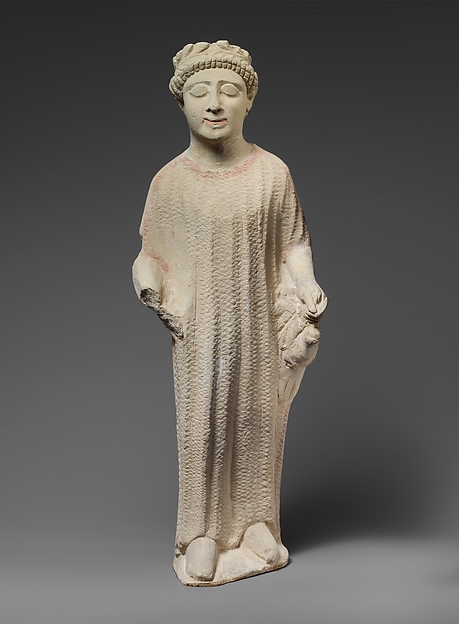 Limestone statuette of a boy holding a dove by an unrecorded maker, The Metropolitan Museum of Art