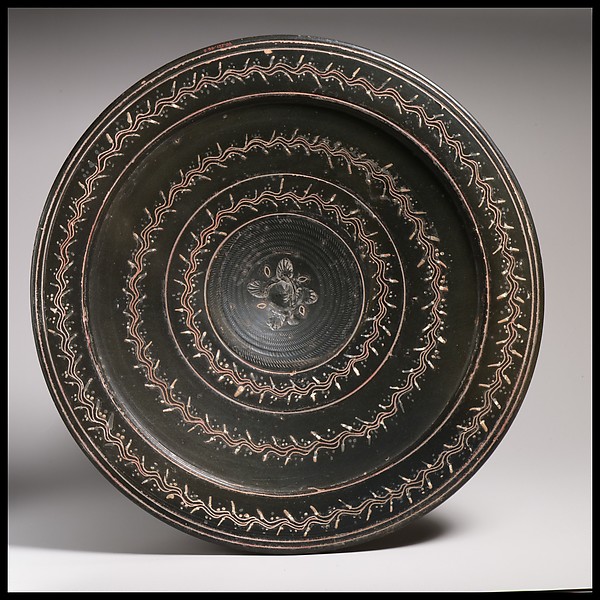 Historical comparison: Terracotta plate