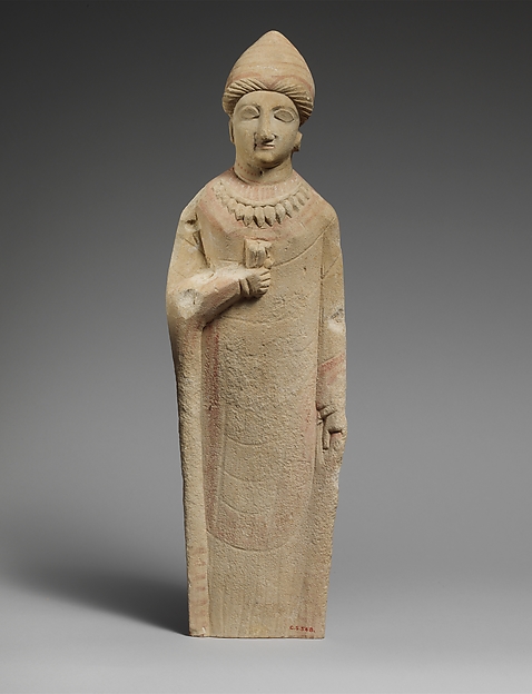 Limestone statuette of a female votary holding a flower by an unrecorded maker, The Metropolitan Museum of Art