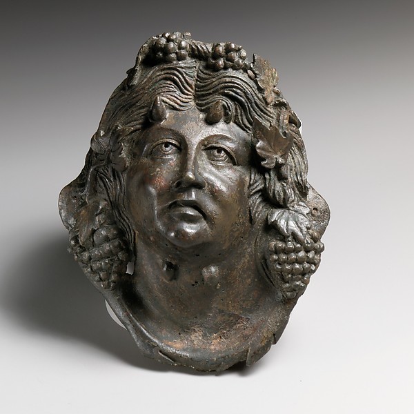 Bronze attachment in the form of the head of Pan