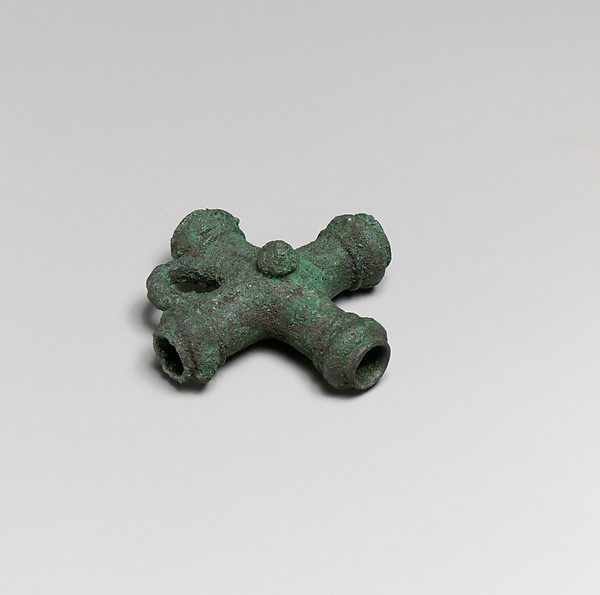 Fragments of a cart or chariot, crossed cylinders
