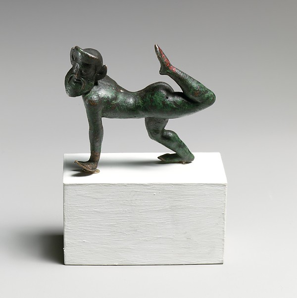 Bronze statuette of  a satyr dancing