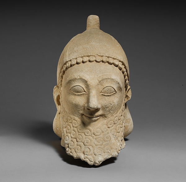 Limestone head of a bearded male wearing a conical helmet by an unrecorded maker, The Metropolitan Museum of Art