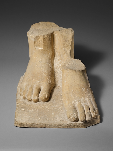 Limestone plinth with the feet of a colossal male statue by an unrecorded maker, The Metropolitan Museum of Art