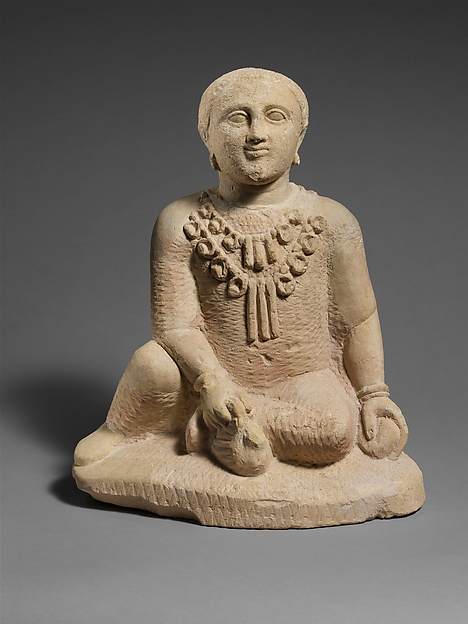 Limestone temple boy, late 5th century BCE
