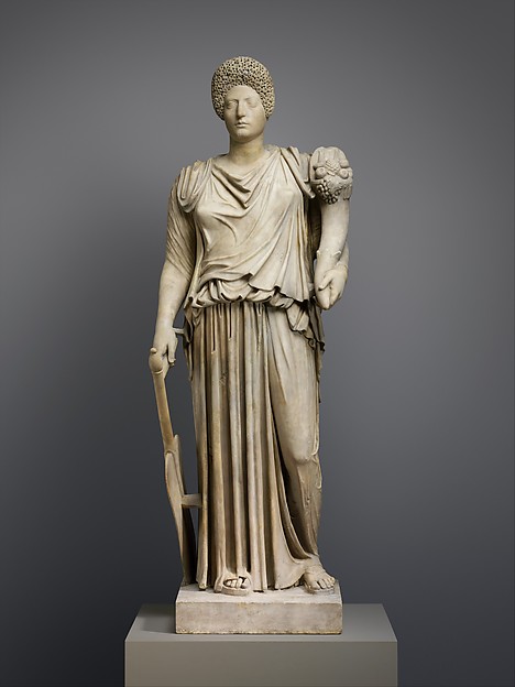 Marble statue of Tyche-Fortuna restored with the portrait head of a woman