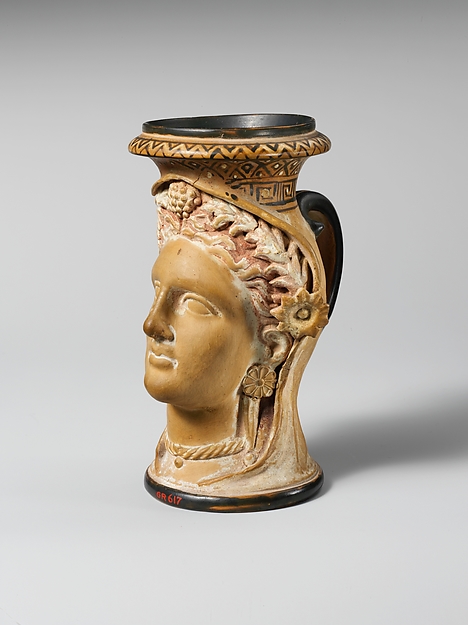Terracotta oinochoe (jug) in the form of a woman's head by an unrecorded maker, The Metropolitan Museum of Art