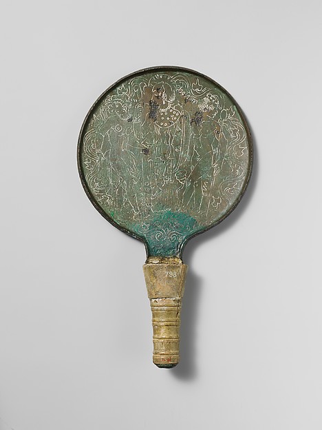 Bronze mirror with ivory handle