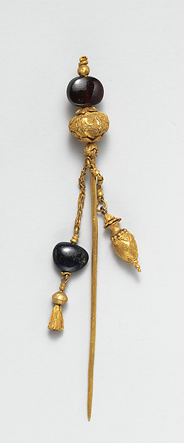 Gold and garnet pin by an unrecorded maker, The Metropolitan Museum of Art