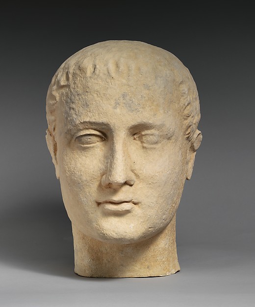 Limestone head of a beardless male votary