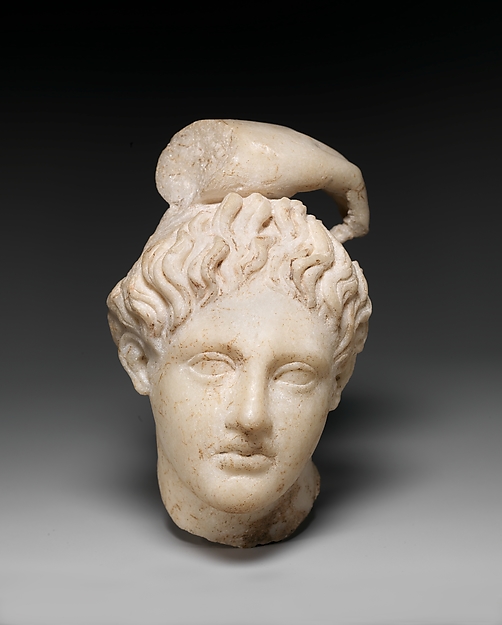 Marble head of Apollo with fragment of his hand by an unrecorded maker, The Metropolitan Museum of Art