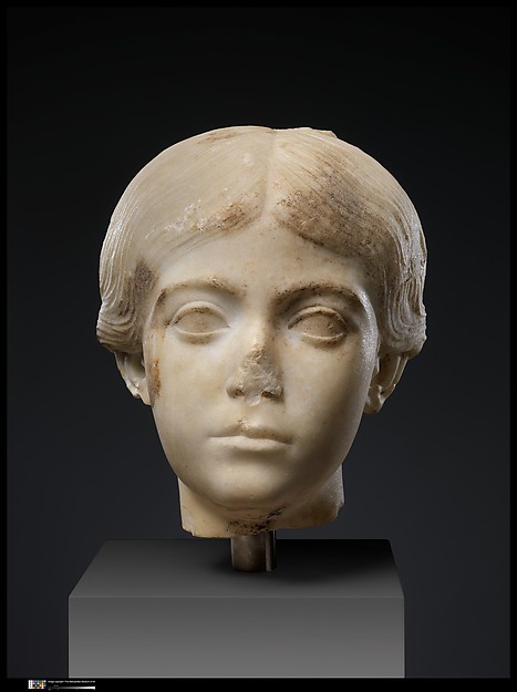 Two marble portrait heads from a relief
