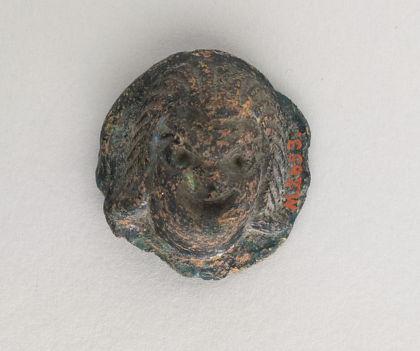 Glass appliqué with theatrical mask