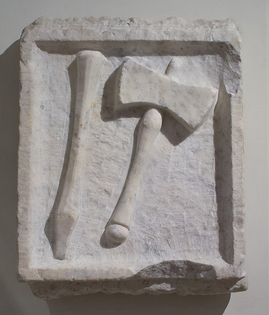 Marble relief of a chisel and mallet, 2nd century CE