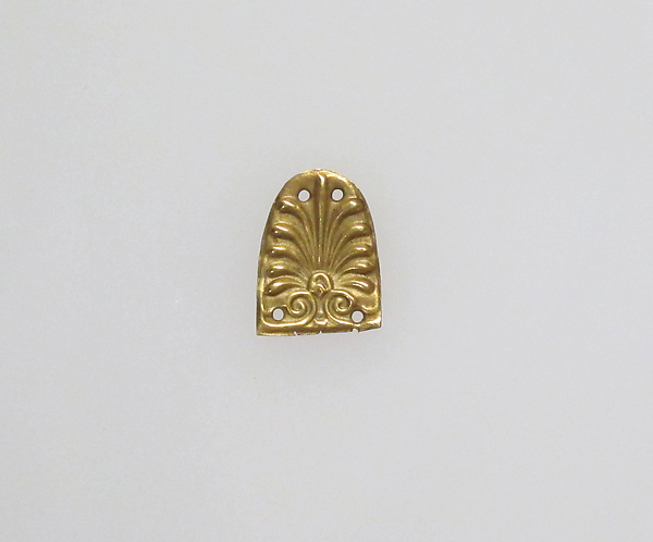 Three gold appliqués