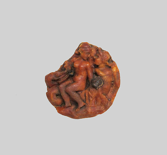 Amber disk with a nereid riding a triton by an unrecorded maker, The Metropolitan Museum of Art