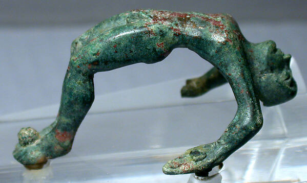 Bronze handle of a cista with nude youth by an unrecorded maker, The Metropolitan Museum of Art