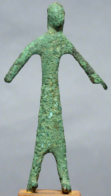 Bronze statuette of man with extended arms