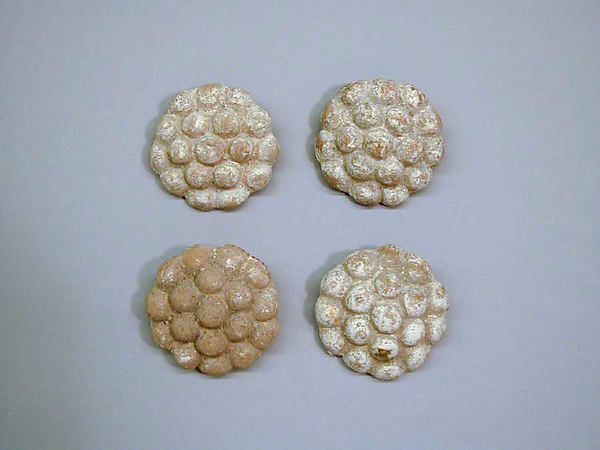 Four terracotta disks