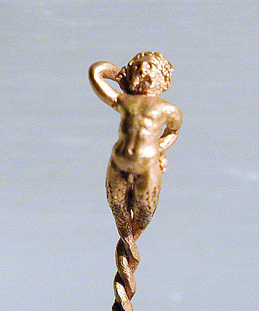 Gold earring in the form of a bearded satyr or triton by an unrecorded maker, The Metropolitan Museum of Art